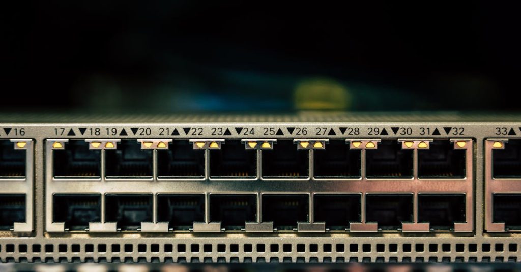 Detailed view of a network switch featuring multiple ethernet ports and LED indicators.