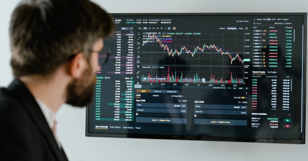 A businessman in a suit looks at a screen displaying stock market charts and data analysis.